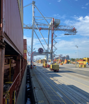 crane and red container